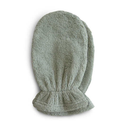 Zachte en absorberende groene washandjes van het merk Mushie